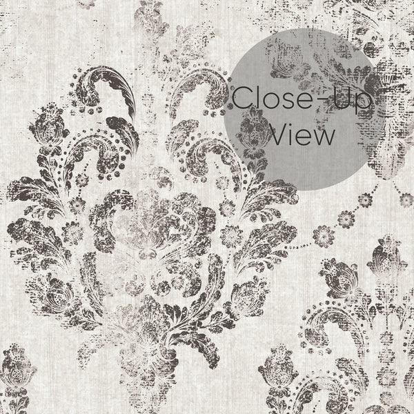 Ornate damask design with rubbed charcoal tones on gray, featuring a vintage print effect. Ideal for a modern classic living room or hallway, this wallpaper adds sophisticated texture and style.