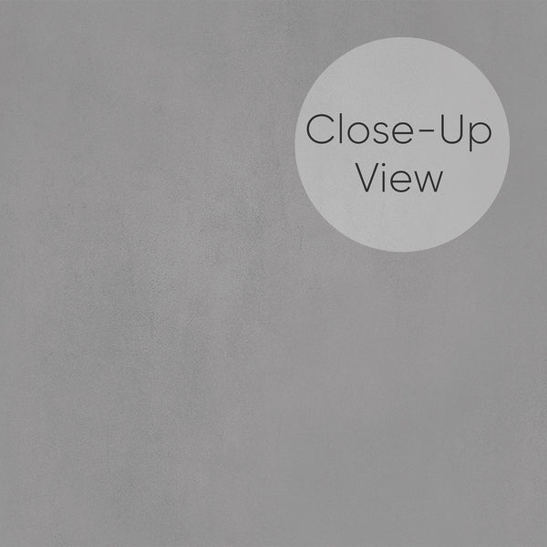 Sophisticated Gray Plaster Look Wallpaper with a troweled plaster appearance and soft tonal shifts. This self-adhesive wallpaper is ideal for modern spaces like bedrooms or living rooms, offering a continuous, neutral backdrop and easy repositioning for renters.