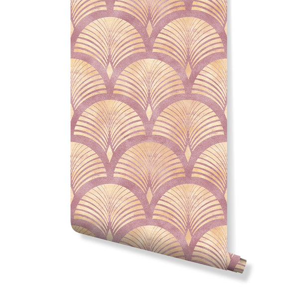 Large-scale Pink Art Deco scallop wallpaper with muted rose background and warm cream-to-gold arcs. Featuring vintage-style abrasion for a relaxed glam look, this removable peel and stick design is ideal for living rooms or bedrooms, offering a broad decorative repeat that suits elegant interiors. Perfect for renters and decorators seeking high-quality, eco-friendly options.