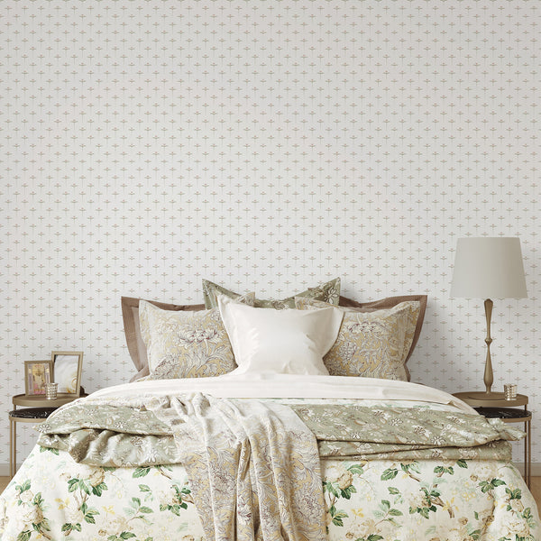 Pink and green flower wallpaper featuring a tiny repeating botanical pattern with simple geometric blooms and dotted stems on a white background.