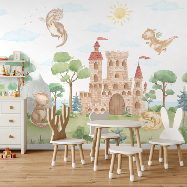 Dragon wallpaper featuring playful watercolor dragons flying and resting around a storybook castle with green trees, mountains and soft blue clouds.