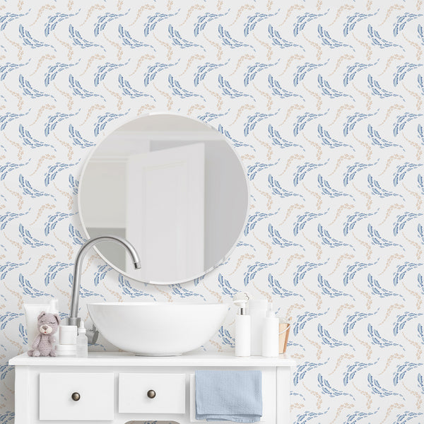 Blue fish wallpaper featuring watercolor schools of swimming fish in soft blue and sandy beige on a clean white background for coastal decor.