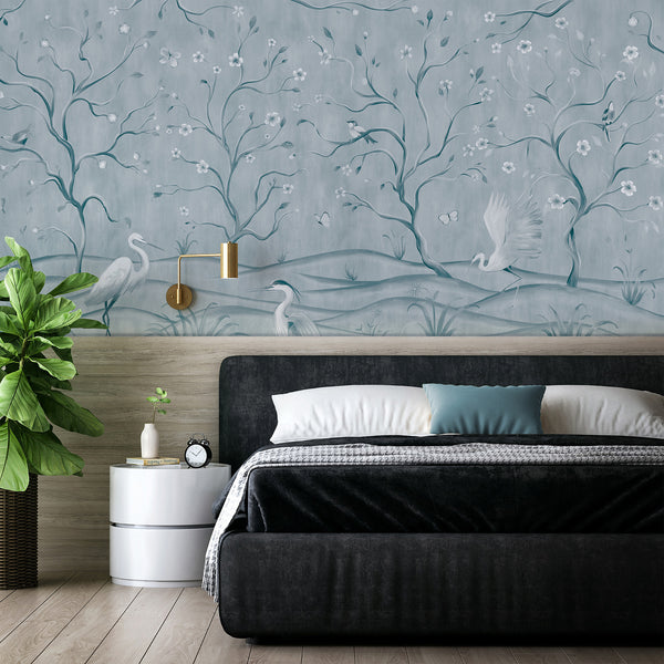 Blue heron wall mural featuring graceful white birds, delicate blossoms, winding branches and botanical details in a vintage Asian style.