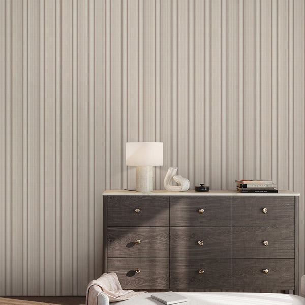 Removable beige and brown striped wallpaper with narrow woven-style vertical lines and a soft fabric-inspired appearance, suitable for neutral bedroom decor.