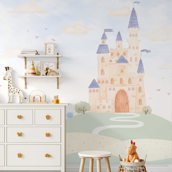 Kids castle wallpaper with a dreamy beige and blue fairytale kingdom surrounded by pastel hills, tiny trees, birds and soft watercolor style clouds.
