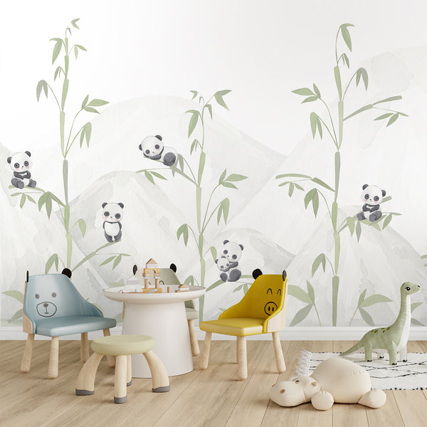 Neutral nursery wallpaper with adorable black and white pandas, sage green bamboo and subtle watercolor mountains for a gender neutral baby room.