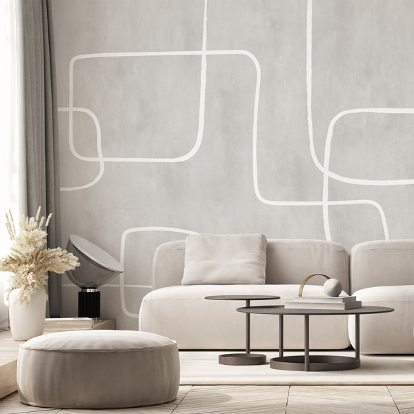Modern abstract wallpaper featuring soft gray tones and continuous white curved lines for a clean, calm, contemporary living room or bedroom wall.