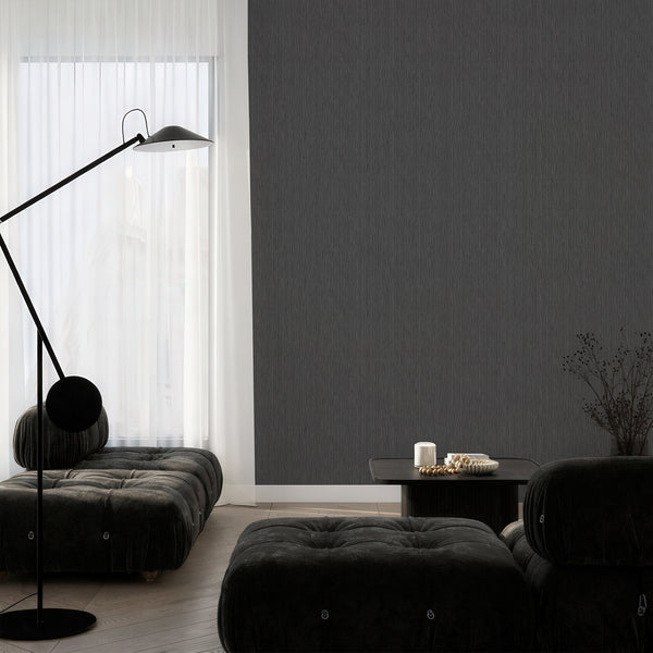 Dark gray textured wallpaper with light and dark gray threads, creating a low-contrast variegation for a modern living room. Ideal for renters, made from eco-friendly materials.