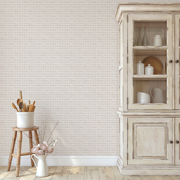 Taupe and light beige geometric wallpaper featuring a tight lattice pattern on an off-white, slightly plastered ground. This peel and stick wallpaper is perfect for adding quiet texture to hallways.