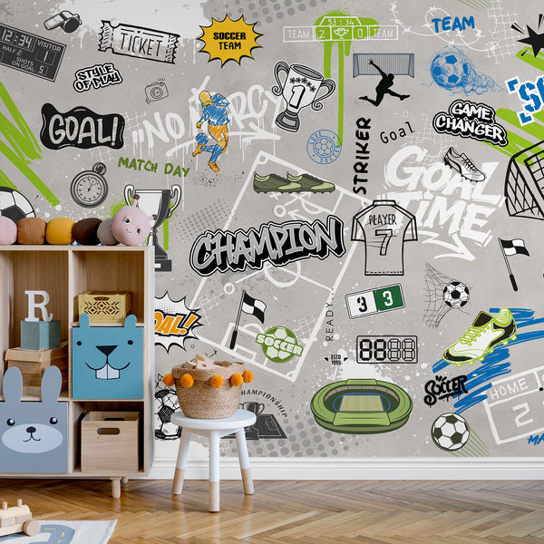 Close-up of soccer graffiti wall mural bursting with street art style, featuring comic bursts and hand-drawn soccer icons. The bold palette of neon and royal blue adds energy to children's rooms or sports-themed spaces. Easy to install and remove, ideal for modern decor.