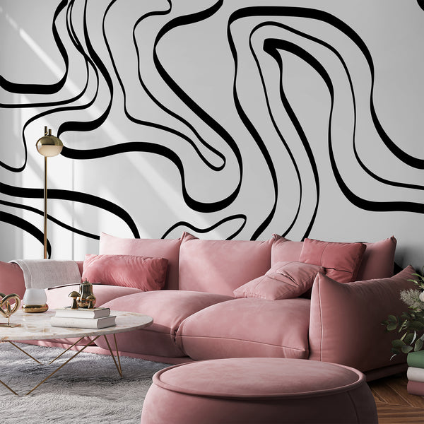 Modern black and white wall mural with sweeping organic line art on a clean white background, ideal for a contemporary living room accent wall.