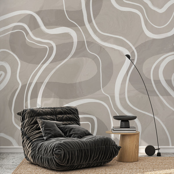 Beige and white abstract wallpaper with flowing organic lines and soft textured shading, designed for a modern bedroom or living room.