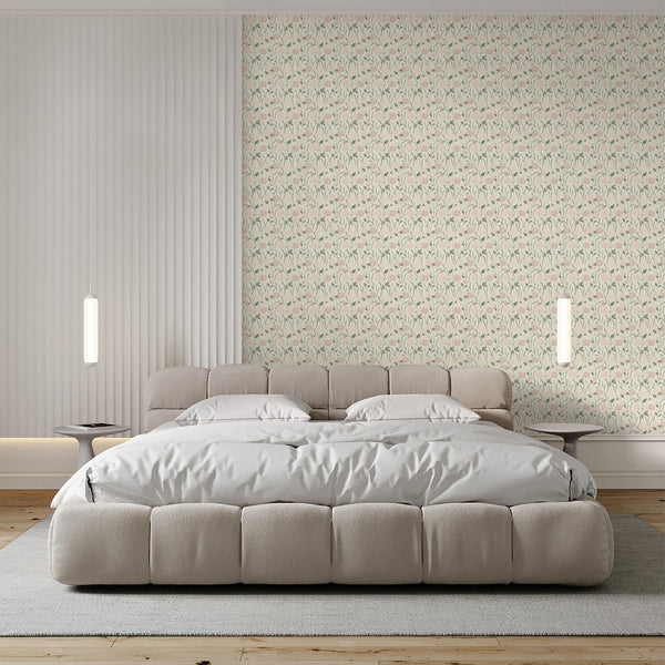 Cottagecore floral wallpaper featuring blush pink flowers and sage green botanical stems on a lightly textured cream background for a charming interior.