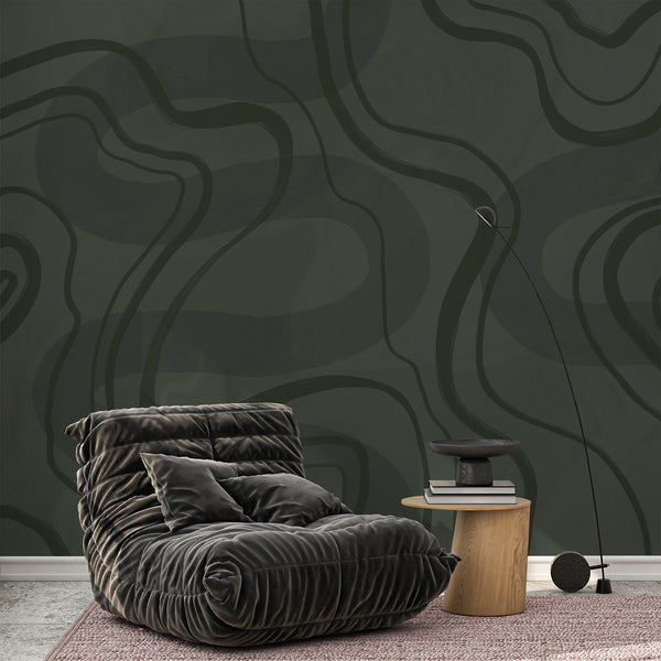 Deep olive green wallpaper with oversized organic curves and softly textured layers, designed for modern bedroom and living room decor.