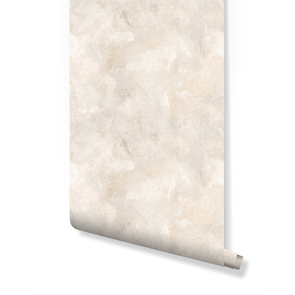 Beige Limewash Plaster Wallpaper with warm beige, pale sand, and chalky white tones. Features organic, painterly strokes and subtle scrapes for a textured look. Ideal for modern minimalist or Japandi interiors, adding a calm backdrop in living rooms or bedrooms. Made from removable peel and stick material, eco-friendly, and suitable for renters.