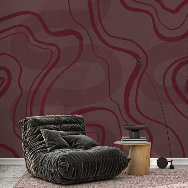 Burgundy abstract wallpaper with oversized organic curves and a muted dusty mauve background, designed for modern minimalist home interiors.