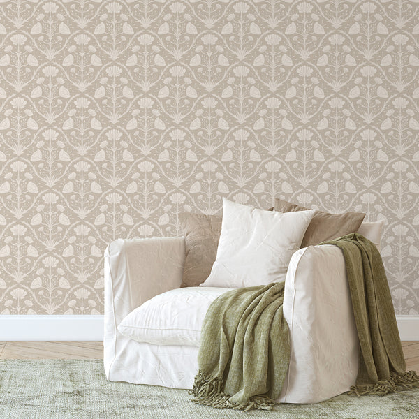 Stylized blooms and scrolling acanthus motifs in beige, creating a dense tapestry repeat for living rooms. The vintage floral design and soft highlights provide a classic, understated elegance to traditional interiors.