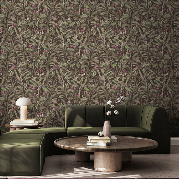 Vintage jungle wallpaper with colorful parrots, large banana leaves, ferns and dusty pink tropical flowers against a rich dark brown background.