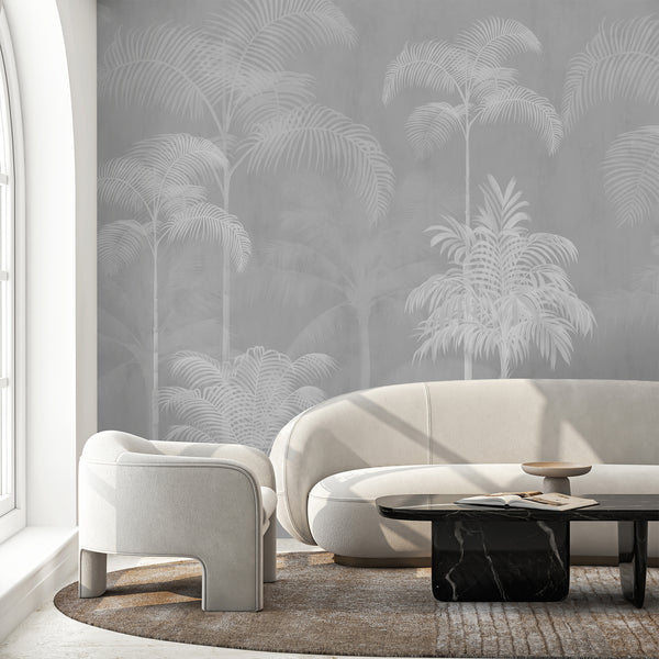 Gray tropical wall mural featuring graceful white palm trees and softly faded botanical foliage for a modern minimalist bedroom accent wall.