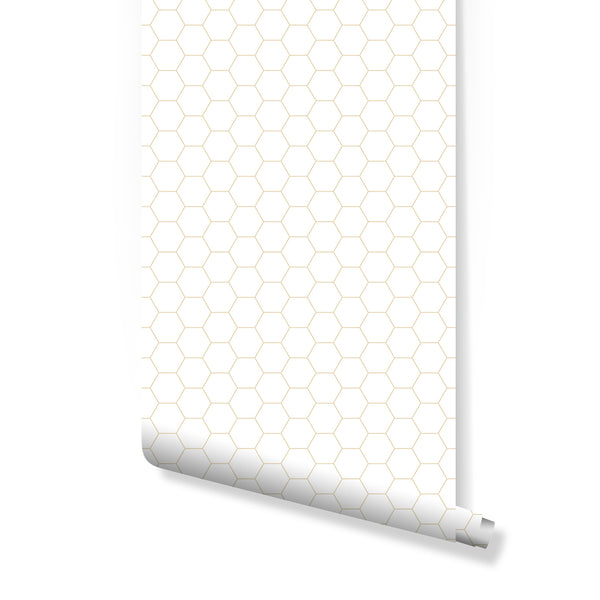 Beige Honeycomb wallpaper with fine hexagon outlines on bright white, offering a clean, modern geometric look. This removable peel and stick wallpaper suits kitchens or home offices, providing a subtle grid pattern that complements Scandinavian or minimalist interiors. Made in the USA with eco-friendly materials.
