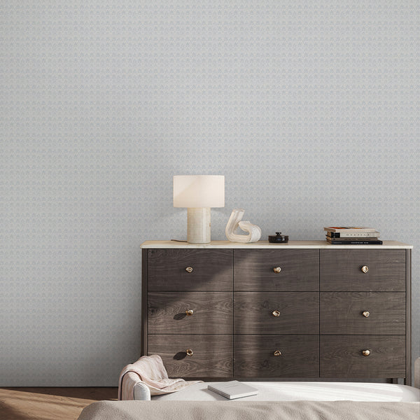 Soft blue damask wallpaper featuring vintage floral motifs with a subtle distressed finish, ideal for bedroom, living room or powder room decor.