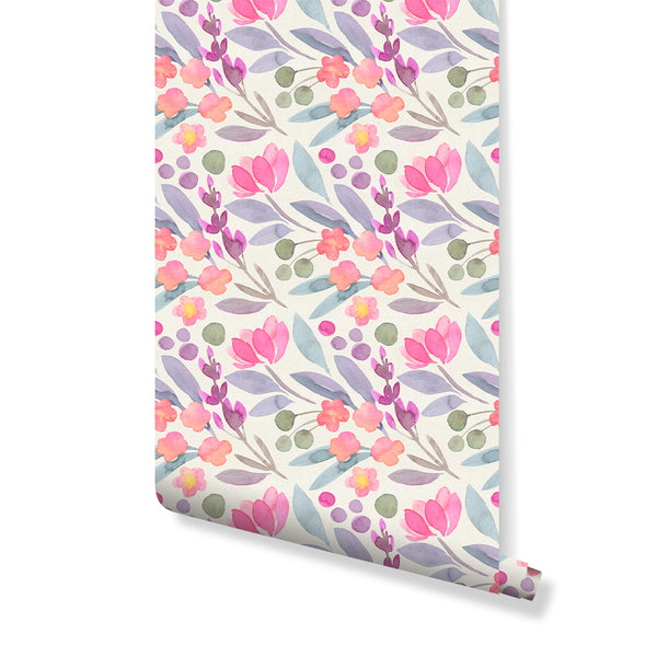 Pink Flowers Wallpaper with watercolor floral sprigs in blush pink, coral, and mauve on an off-white ground. The hand-painted, dense pattern suits nurseries or powder rooms, offering a cheerful backdrop for cottage or modern farmhouse interiors. This removable wallpaper is eco-friendly and easy to apply, perfect for decorators.