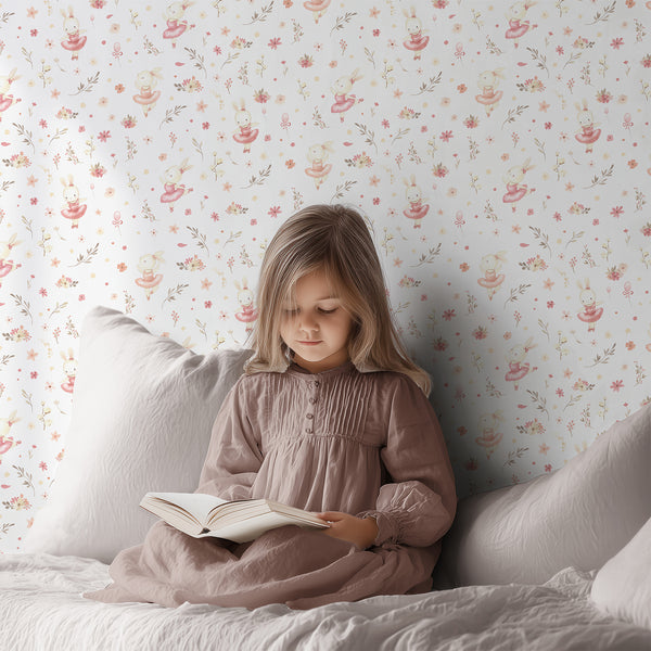 Watercolor ballet bunny wallpaper with a dancing rabbit, pink flowers, beige botanical branches, and playful dots for a sweet baby girl nursery.