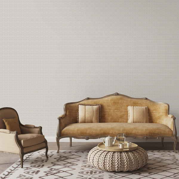Soft beige floral wallpaper with faded damask ornaments and a distressed vintage texture, ideal for French country, cottagecore and neutral home decor.