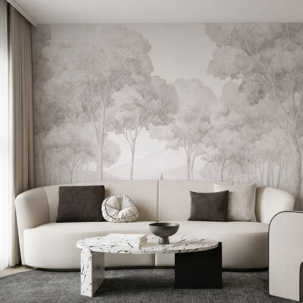 Neutral misty forest wall mural with layered tree silhouettes in soft greige and taupe, creating an upscale living room atmosphere. This removable wallpaper is eco-friendly and perfect for modern farmhouse decor.