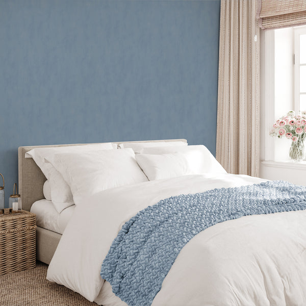 Plaster look wallpaper with a hand-troweled appearance, providing a calm, seamless finish for modern living spaces.