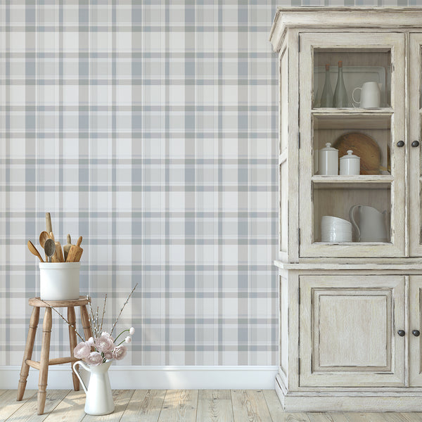 Vintage country plaid wallpaper with intersecting dusty blue, gray and cream stripes, creating a timeless English cottage style with woven texture.