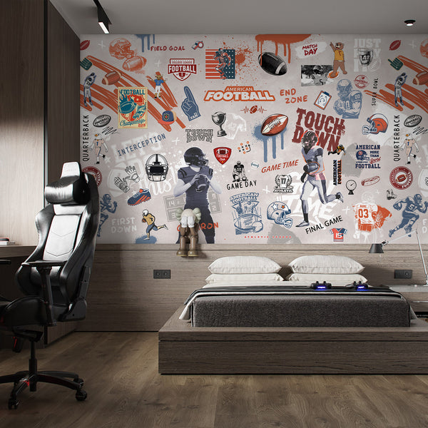 Dynamic football graffiti mural with collage elements of players, helmets, and spray-paint effects, ideal for a modern sports den or game room. The mural combines rust orange, navy blue, and warm gray tones with bold text and halftone textures, adding energetic movement to any interior design.