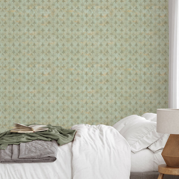 Seafoam green and beige wallpaper with distressed ornamental damask motifs and an aged finish, perfect for farmhouse bedroom or vintage living room decor.