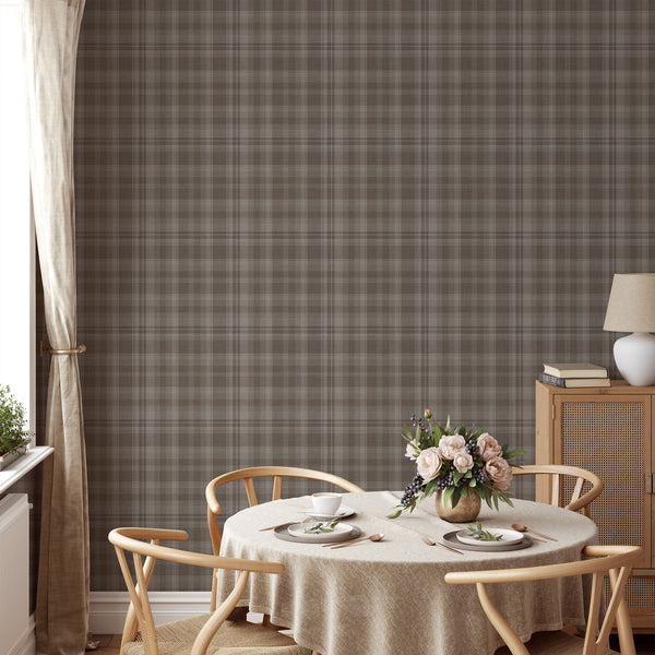 Neutral farmhouse plaid wallpaper featuring delicate intersecting stripes in muted taupe, warm brown and beige, creating a cozy look for living room accent walls.