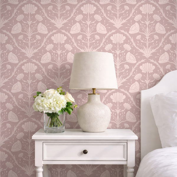 Dusty pink floral wallpaper with mirrored stems, offering a calm, rhythmic pattern for vintage bedrooms.