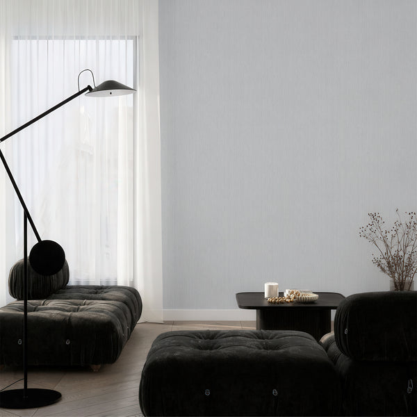 Matte Light Blue Vertical Texture Wallpaper with printed-grain effect, ideal for creating a soft, calming ambiance in bedrooms and hallways. The removable, renter-friendly design is made with high-quality materials, emphasizing eco-friendliness and easy repositioning for decorators.