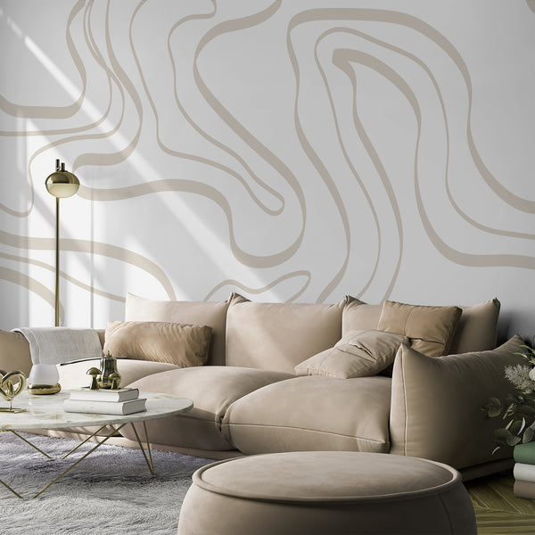 Neutral beige wall mural with sweeping organic line art on a warm white background, ideal for a minimalist living room accent wall.