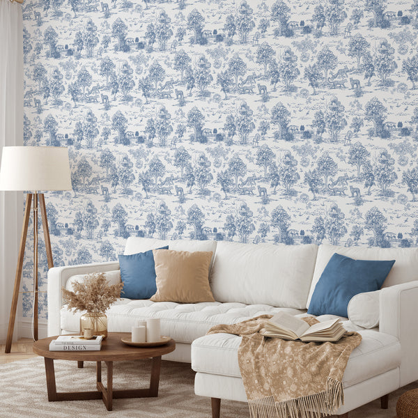 Monochrome blue toile wallpaper with pastoral scenes and wildlife motifs, perfect for creating a traditional ambiance in bedrooms or dining rooms. The eco-friendly, self-adhesive design offers a classic, detailed aesthetic for decorators.