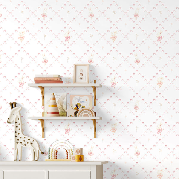 Baby girl wallpaper with a dancing rabbit in a pink ballet dress, dainty ribbon motifs, and a soft watercolor finish for nursery wall decor.