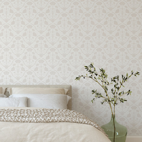 Soft beige botanical motifs on off-white, arranged in rhythmic vertical columns, ideal for a nursery or traditional living room setting.
