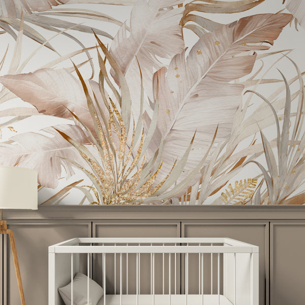 Botanical wall mural featuring expansive banana leaves in soft taupe and peachy-beige tones. The watercolor texture and metallic highlights create a standout design for living rooms or boutique spaces. This self-adhesive wallpaper is Made in the USA from high-quality removable material, ideal for creating a bold, temporary accent wall.