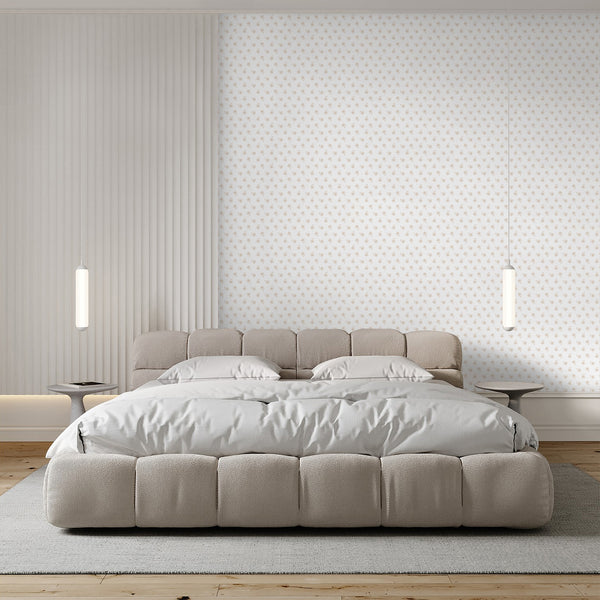 Soft beige wallpaper with delicate repeating floral illustrations and a clean white background for neutral nursery and cottagecore bedroom decor.