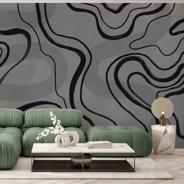 Modern abstract wallpaper with thick black flowing lines and soft gray neutral shading, perfect for contemporary living room or bedroom decor.