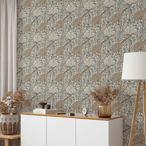 Stylized botanical motifs of Beige Gray Windrush wallpaper with warm beige, muted gray, and dusty teal accents. Engraved linework adds depth to home decor. Perfect for living rooms and hallways. High-quality removable material ensures easy repositioning, suitable for designers.