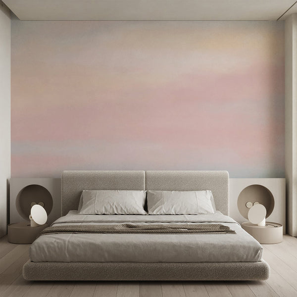 Abstract pastel wallpaper with blurred watercolor layers in blush pink, light blue, peach and warm cream, creating a soft airy look for modern interiors.