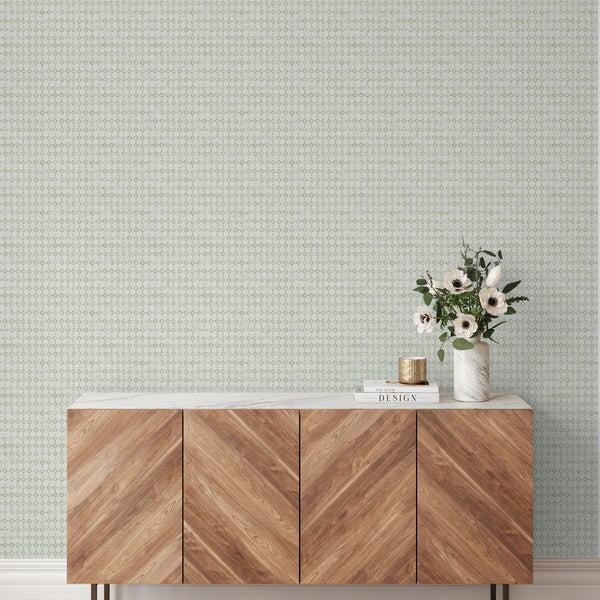 Featuring a tiny sage green diamond lattice on an off-white ground, this wallpaper adds subtle pattern to any room. The removable peel and stick feature ensures easy application, ideal for renters seeking a modern minimalist wall decor option.