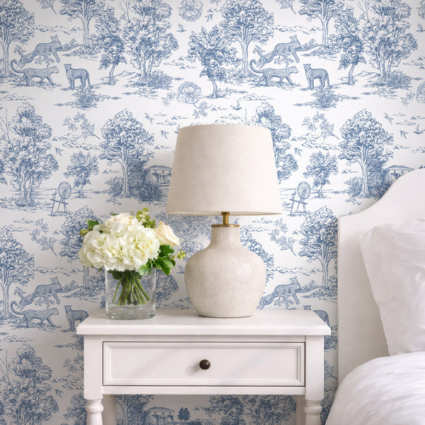 Blue toile wallpaper featuring pastoral scenes with leopards and birds, offering a classic French country style for entryways or bedrooms. The high-quality, removable design is eco-friendly and easy to apply, perfect for statement walls.