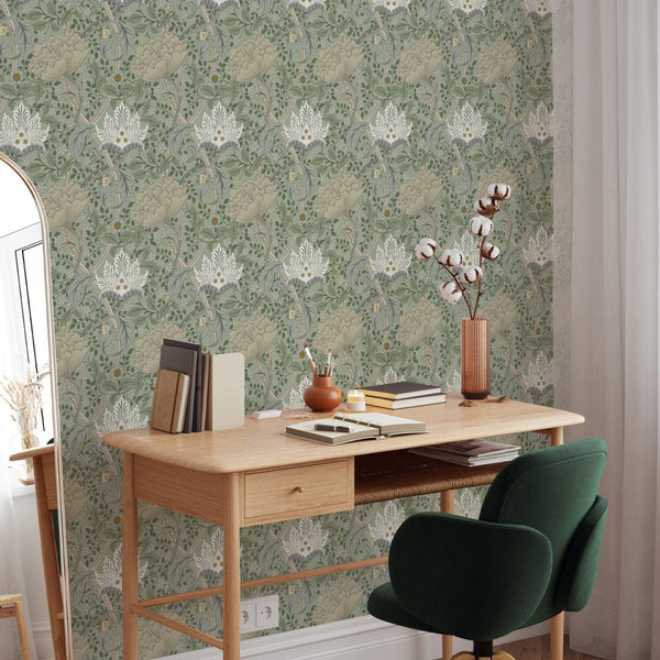 Formal botanical wallpaper by Morris featuring beige blooms and scrolling leaves, set on a green background. Perfect for vintage-inspired dining areas or offices, offering a rhythmic heritage flow.