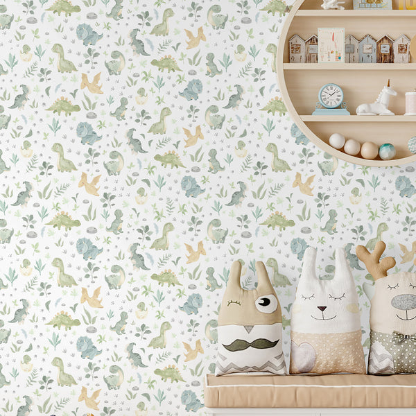 Create a playful nursery with dinosaur floral wallpaper featuring small dinos and foliage on a soft off-white ground. The pastel tones and rhythmic pattern are ideal for modern interiors, offering removable and self-adhesive formats.