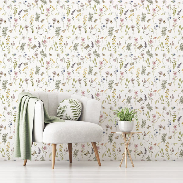 Pastel wildflower wallpaper featuring blush pinks and powder blues, offering a gentle mood for cottagecore bedrooms.